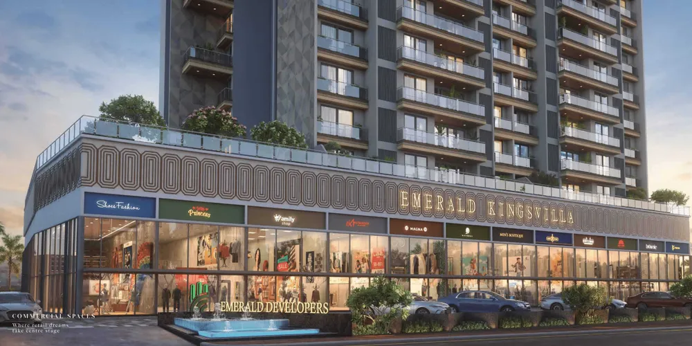Side elevation layout render showing the high-street commercial storefronts and residential design of Emerald Kingsvilla.